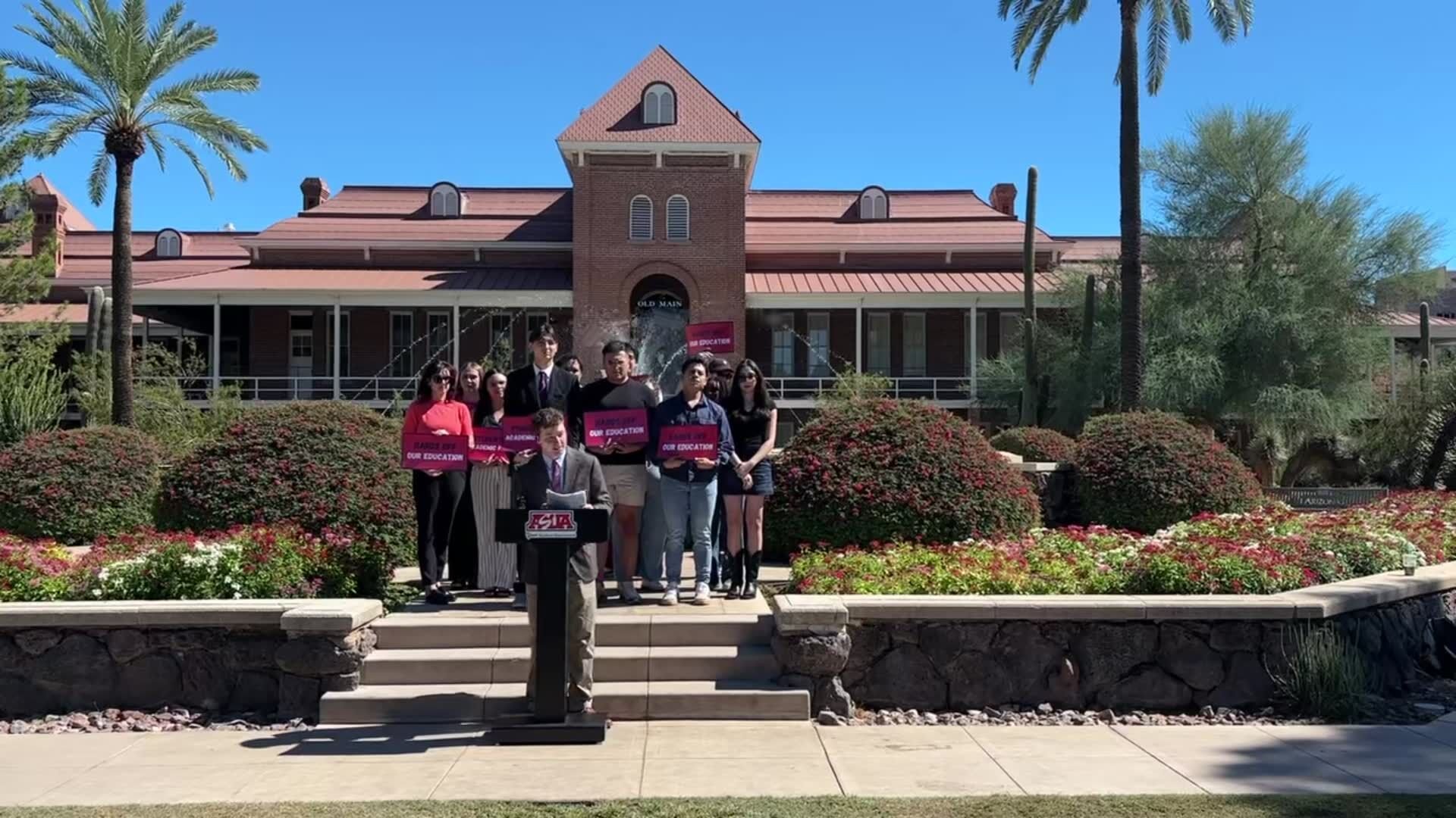 Ben Armentrout, graduate and professional student council for College of Optical Sciences, speaks at a press conference against the White House’s “Compact for Academic Excellenceâ€